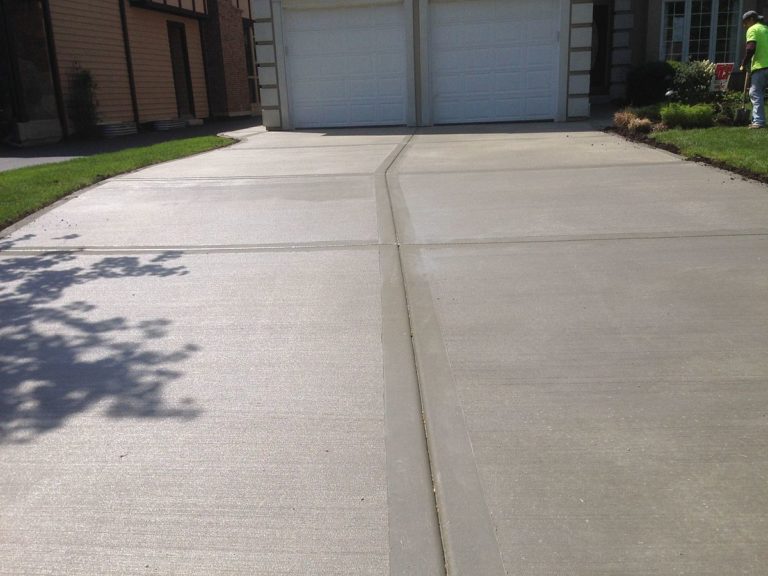A picture of a recently refinished driveway.